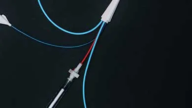 Catheter on black background